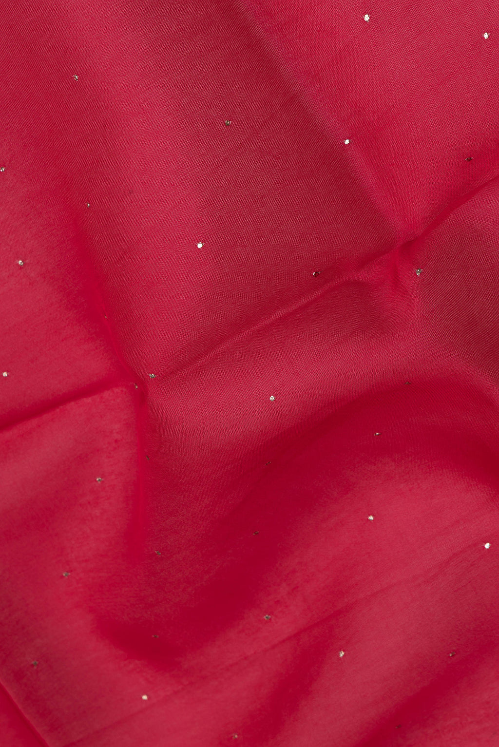 Close up of Red Dual Tone Organza Silk Saree with Embroidery on the body and Zari Border.  displaying folds
