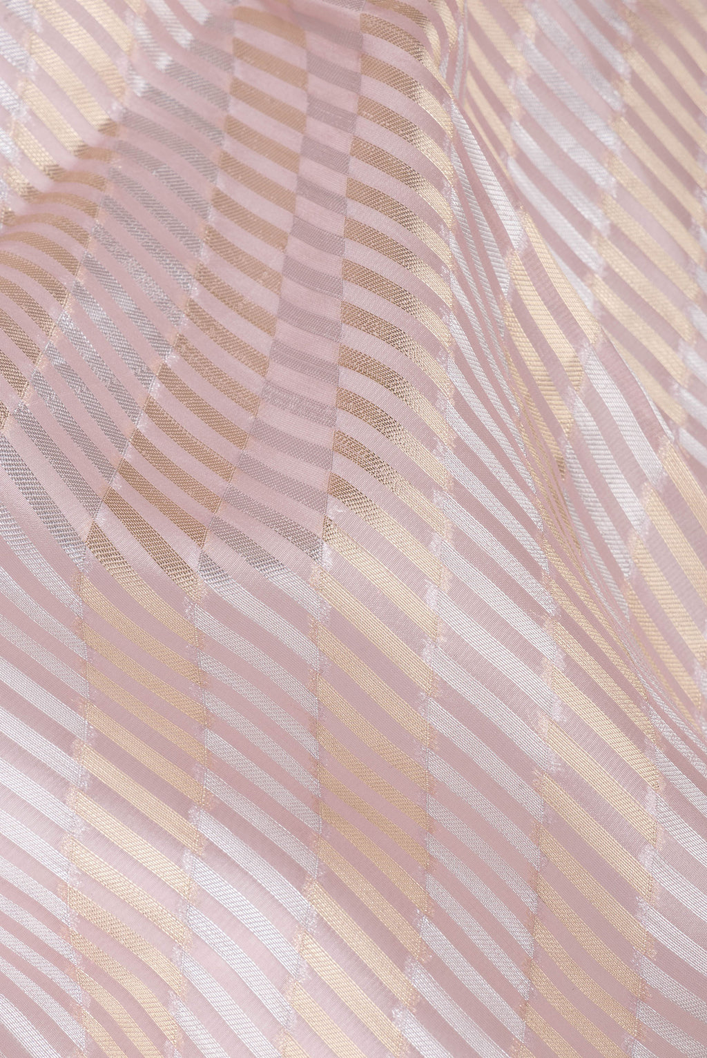 Close up of Pink Dual Tone Organza Saree with Zari Brocade on the body and Embroidery Border.  displaying folds
