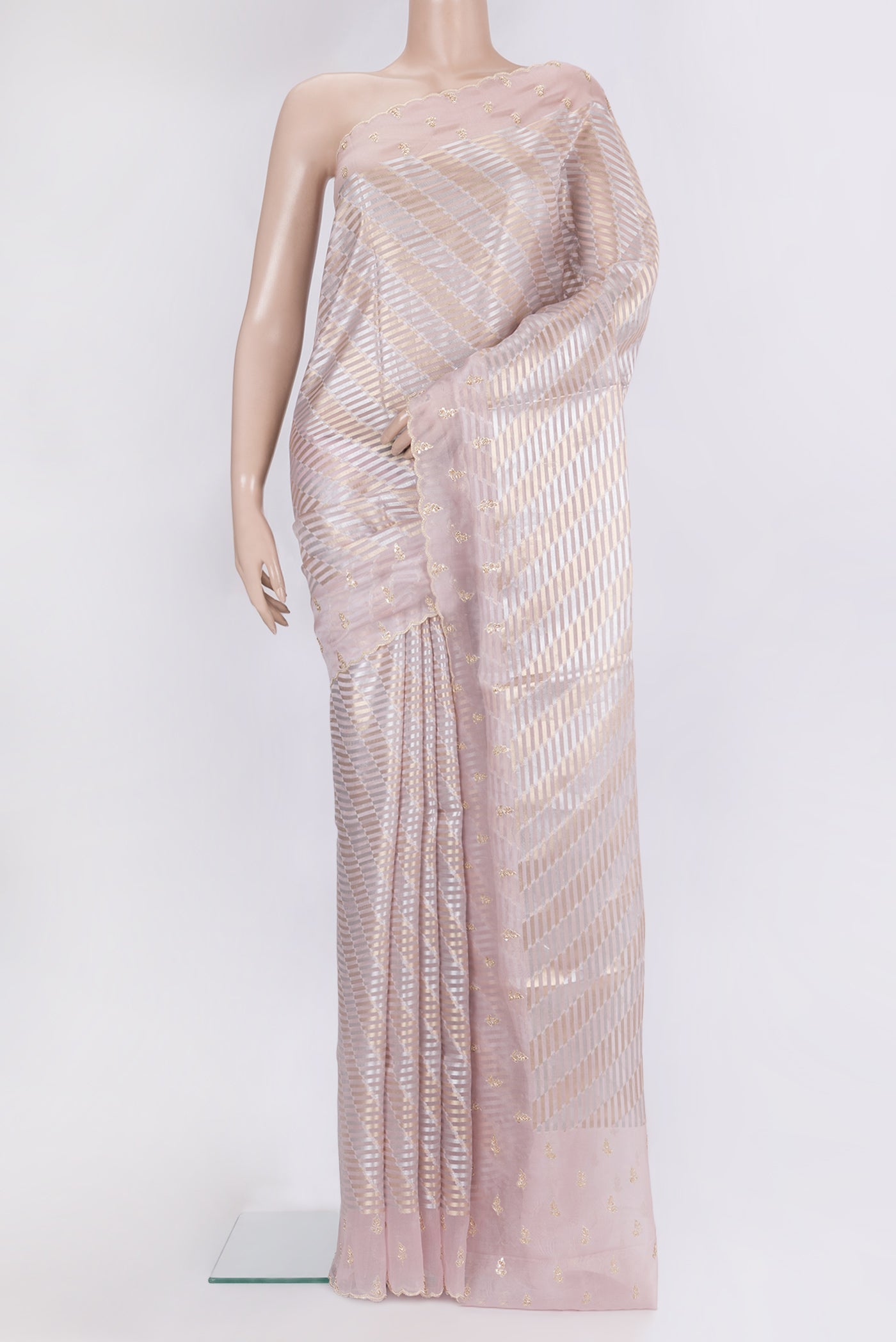 Pink Dual Tone Organza Saree with Zari Brocade on the body and Embroidery Border.  displayed on a mannequin