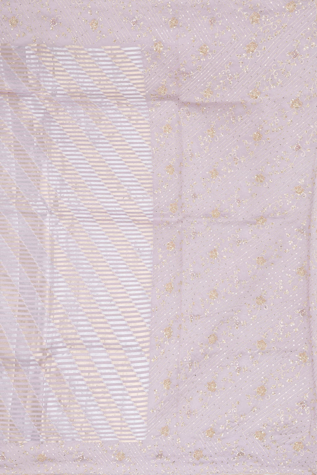 Close up image of the pallu of Lavender Organza Silk Saree with Zari Brocade on the body and Sequin Border. 