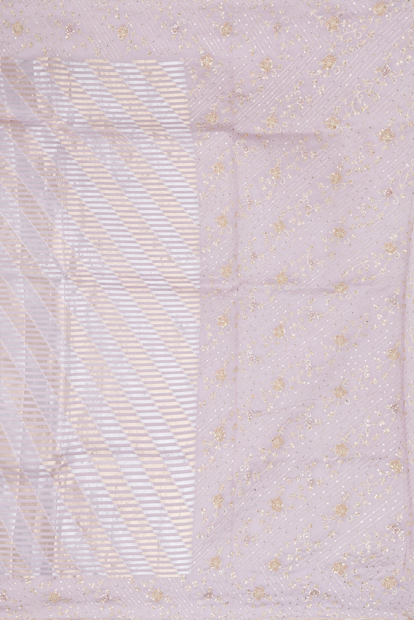 Close up image of the pallu of Lavender Organza Silk Saree with Zari Brocade on the body and Sequin Border. 