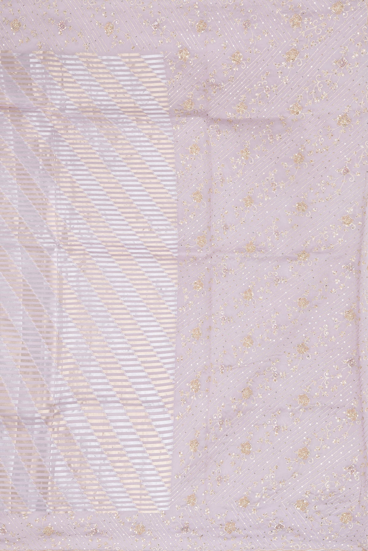 Close up image of the pallu of Lavender Organza Silk Saree with Zari Brocade on the body and Sequin Border. 