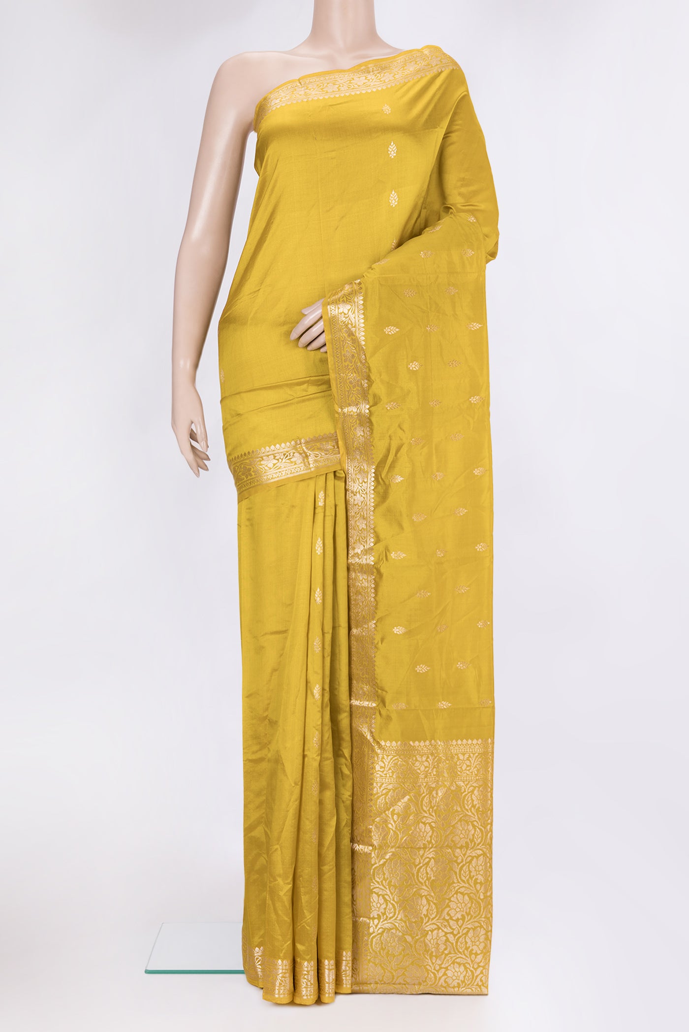 Parrot Green Dual Tone Banarasi Silk Saree with Zari Butta on the body and Zari Border.  displayed on a mannequin