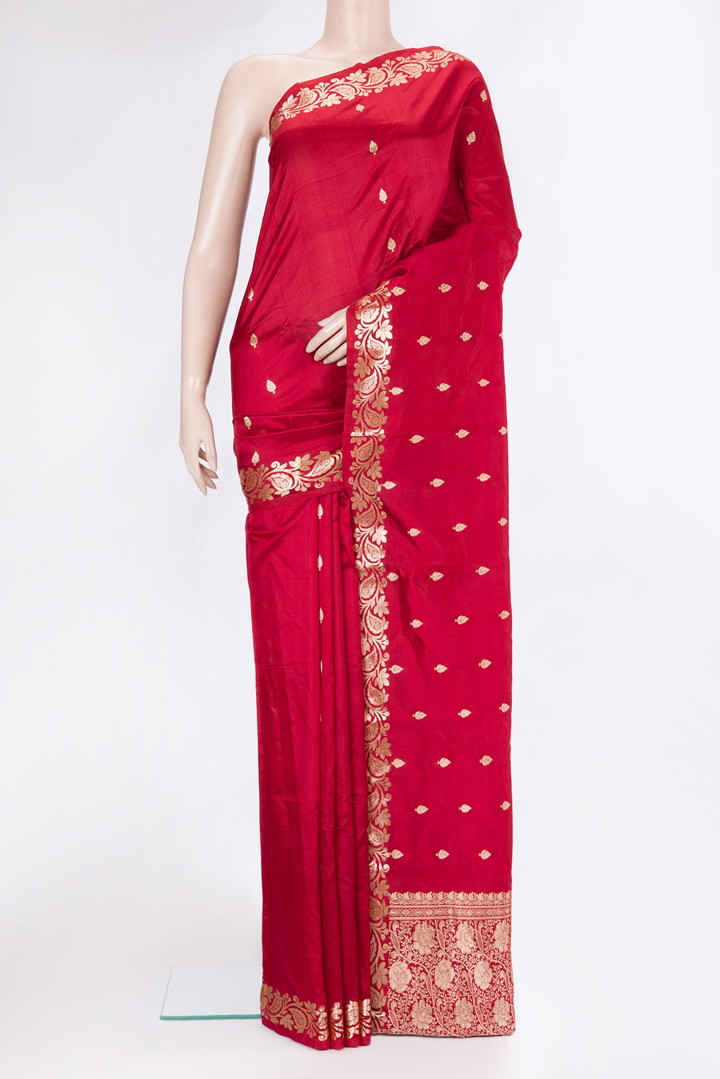 Maroon Banarasi Silk Saree with Zari Butta on the body and Zari Border.  displayed on a mannequin