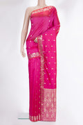 Pure Silk Pink Banarasi Saree with Zari Butta on the body and Zari Border.  displayed on a mannequin