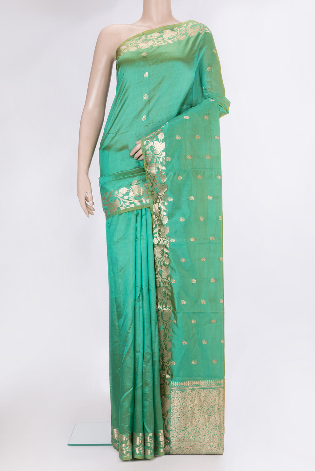 Sea Green Dual Tone Banarasi Silk Saree with Zari Butta on the body and Zari Border.  displayed on a mannequin