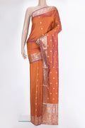 Pure Silk Rust Banarasi Katan Saree with Zari Butta on the body and Zari Border.  displayed on a mannequin