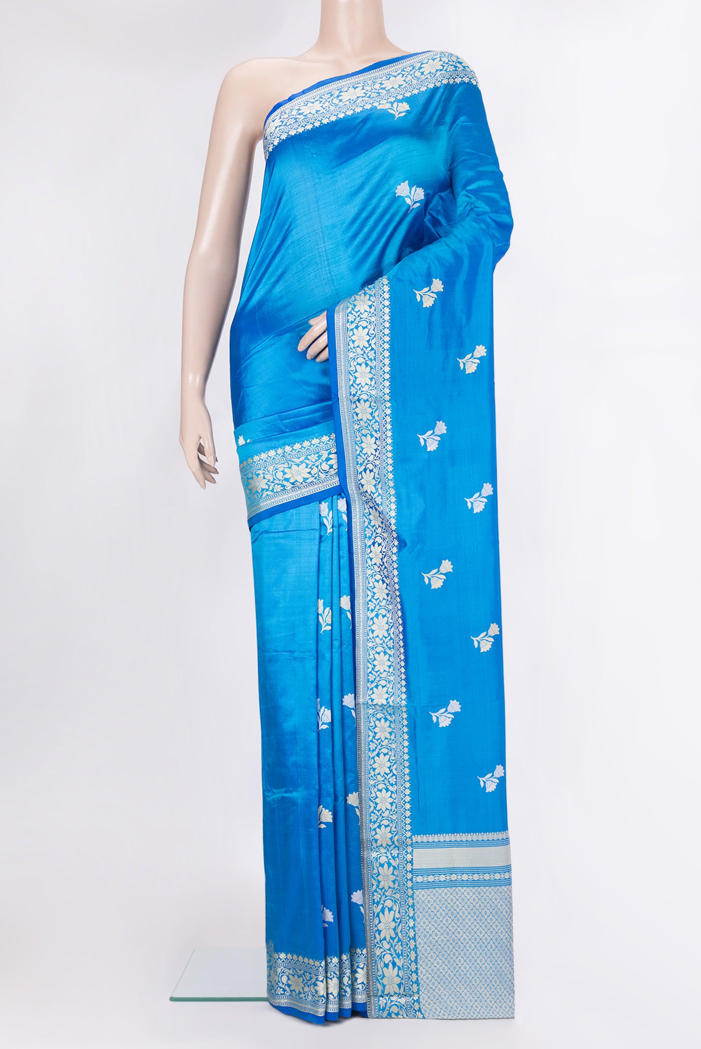 Royal Blue Banarasi Silk Saree with Thread Butta on the body and Thread Border.  displayed on a mannequin