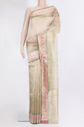 Gold Organza Saree with Zari Butta on the body and Zari Border.  displayed on a mannequin