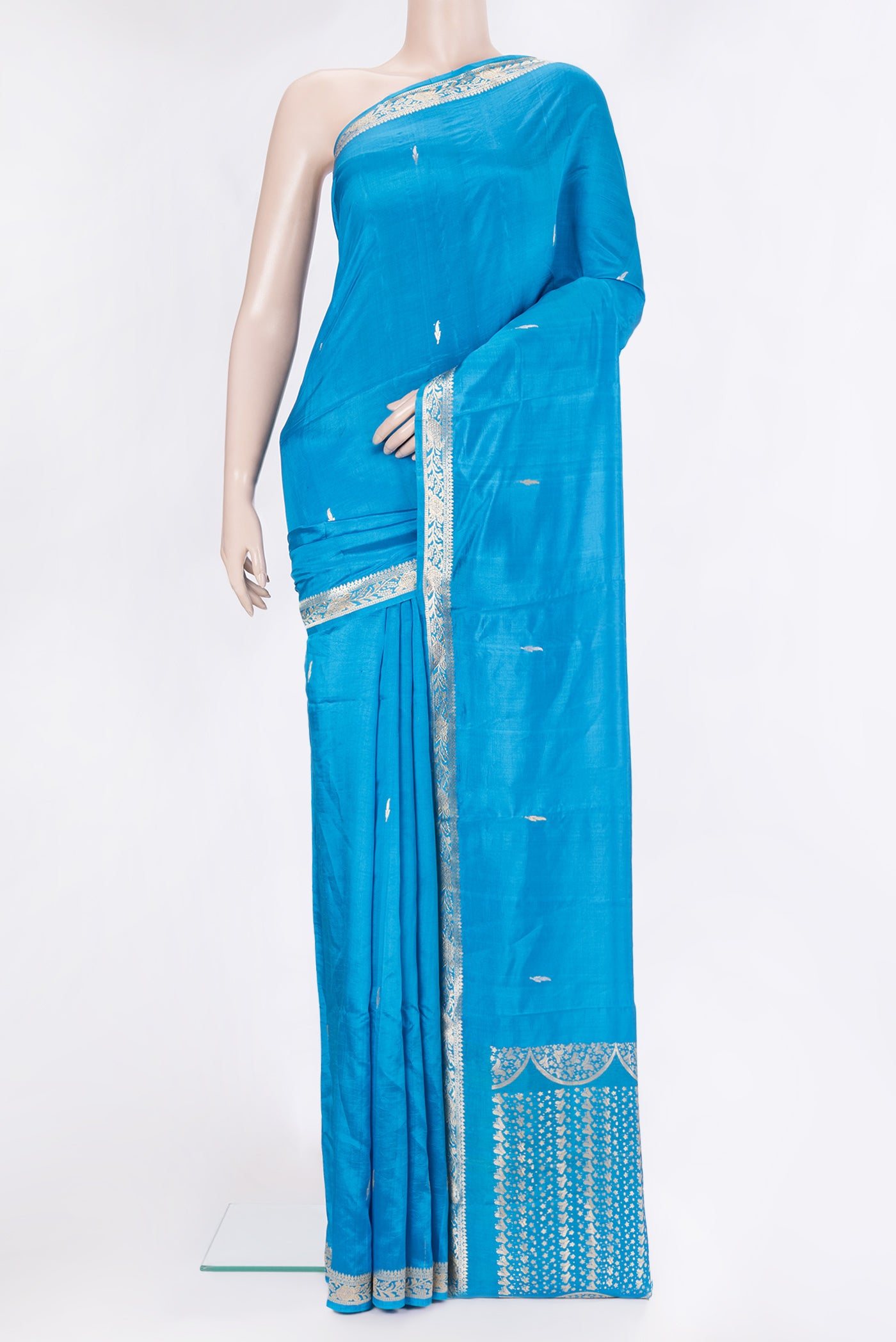 Sky Blue Banarasi Silk Saree with Zari Butta on the body and Zari Border.  displayed on a mannequin