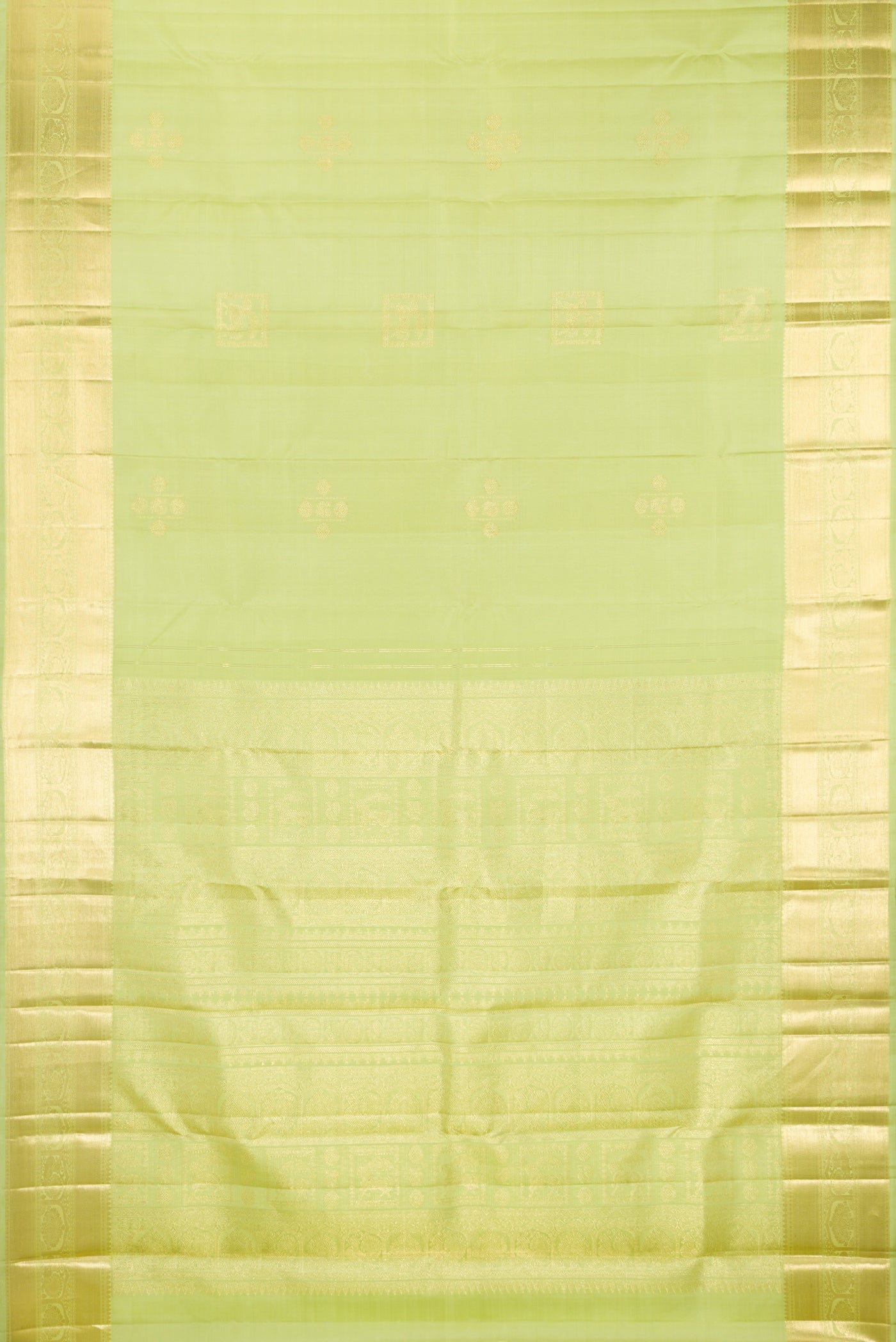 Flat view of Pure Silk Pista Green Kanjivaram Saree with Zari Butta on the body and Zari Border. 