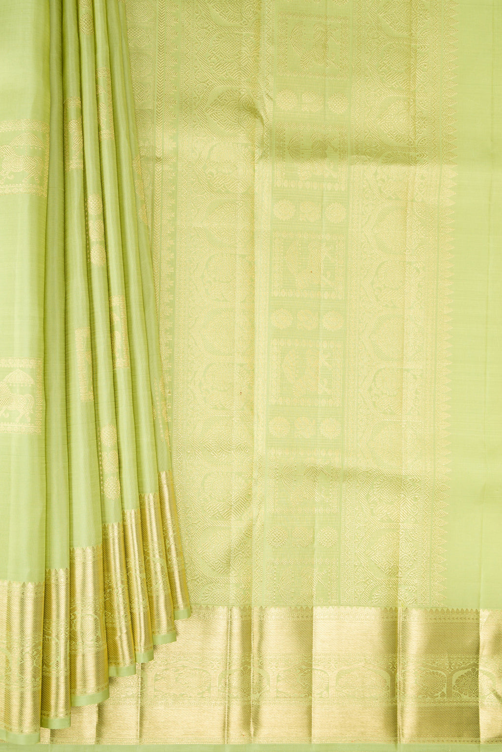 Pleats and pallu of Pure Silk Pista Green Kanjivaram Saree with Zari Butta on the body and Zari Border. 