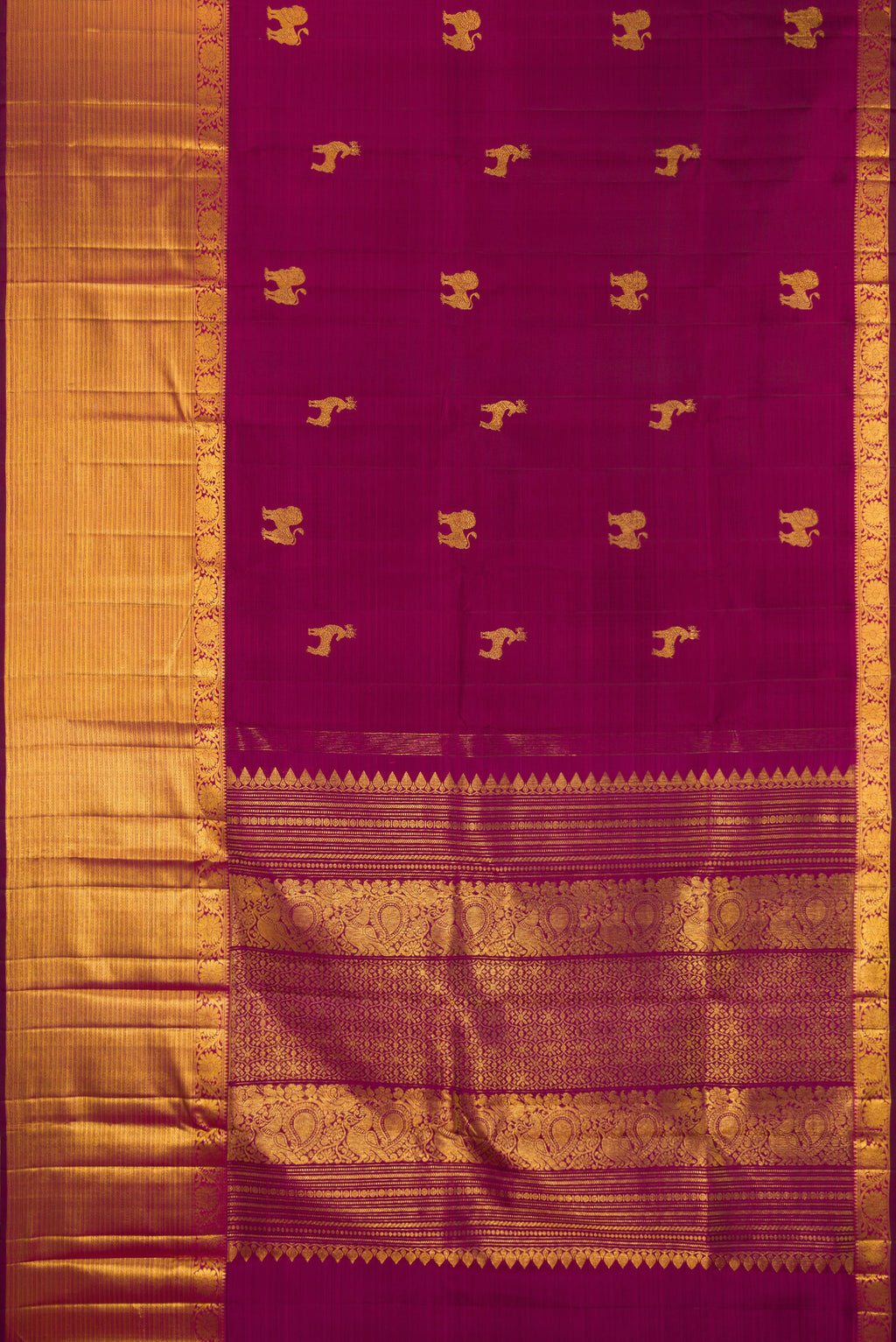 Flat view of Pure Silk Magenta Kanjivaram Saree with Zari Butta on the body and Zari Border. 