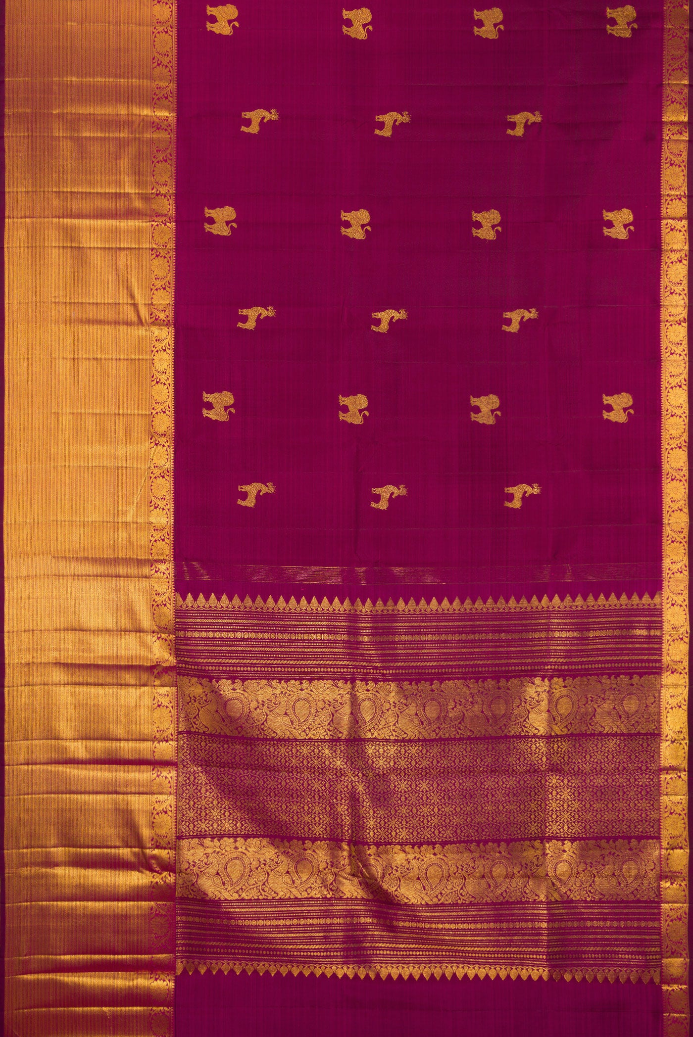 Flat view of Pure Silk Magenta Kanjivaram Saree with Zari Butta on the body and Zari Border. 