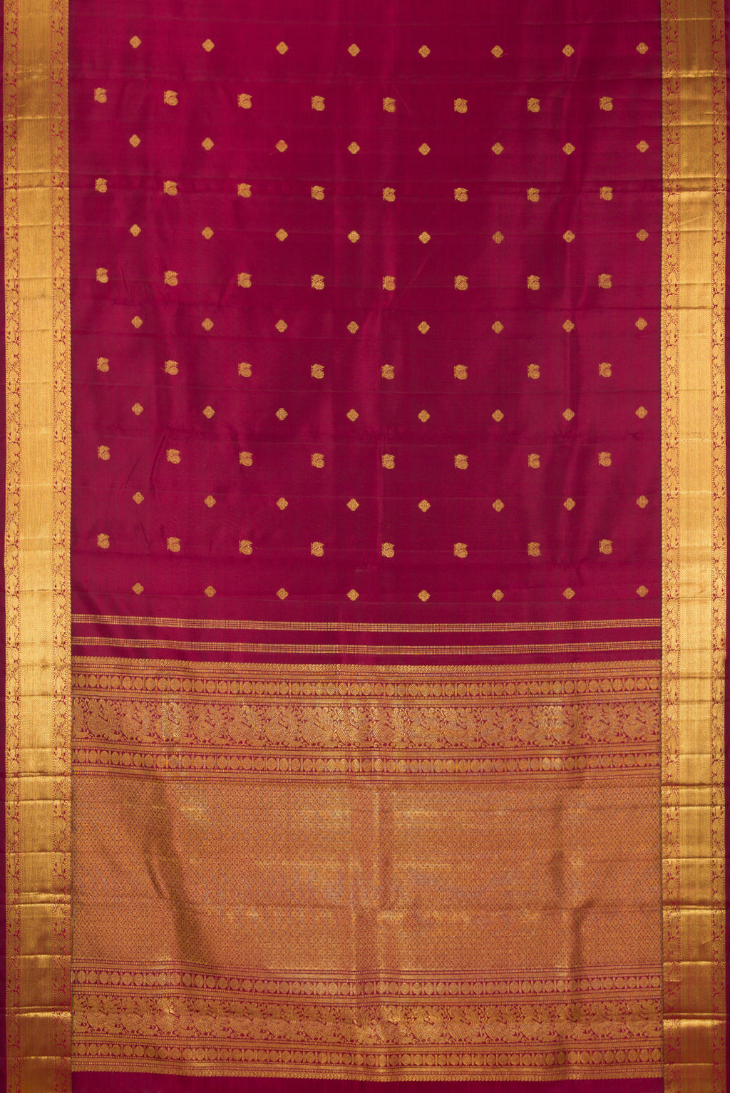 Flat view of Pure Silk Pure Zari Maroon Dual Tone Kanjivaram Saree with Zari Butta on the body and Zari Border. 