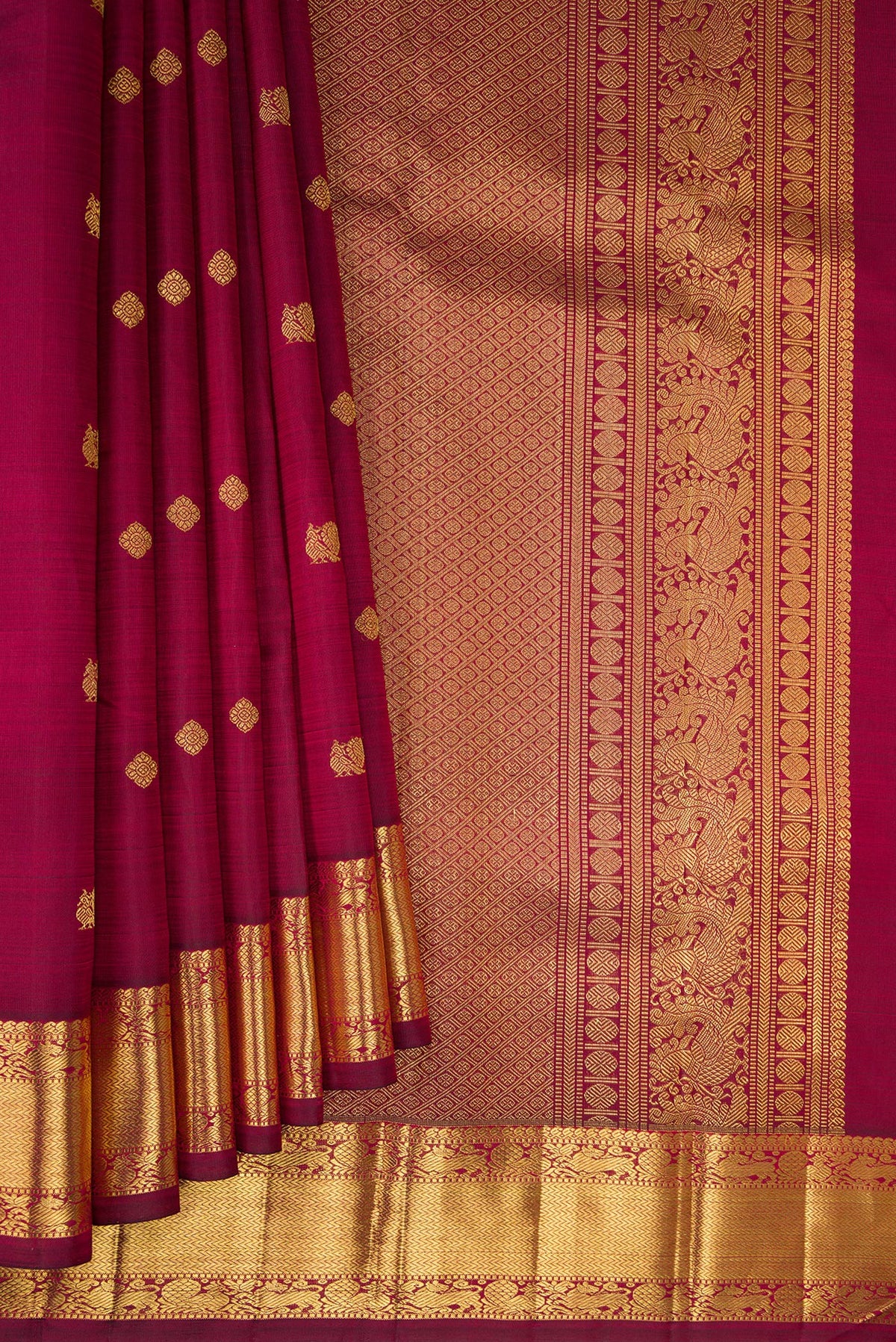 Pleats and pallu of Pure Silk Pure Zari Maroon Dual Tone Kanjivaram Saree with Zari Butta on the body and Zari Border. 