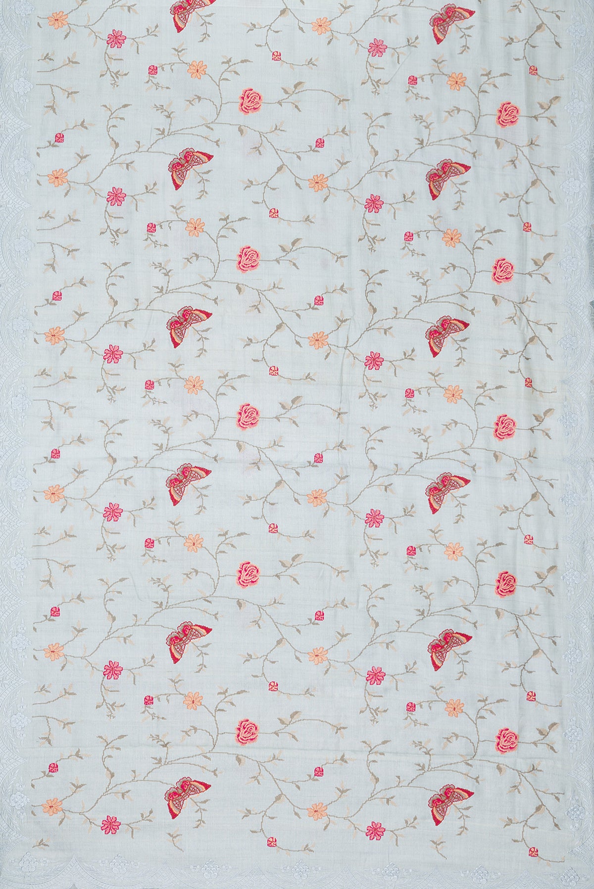 Flat view of Light Blue Tussar Saree with Embroidery on the body and Embroidery Border. 
