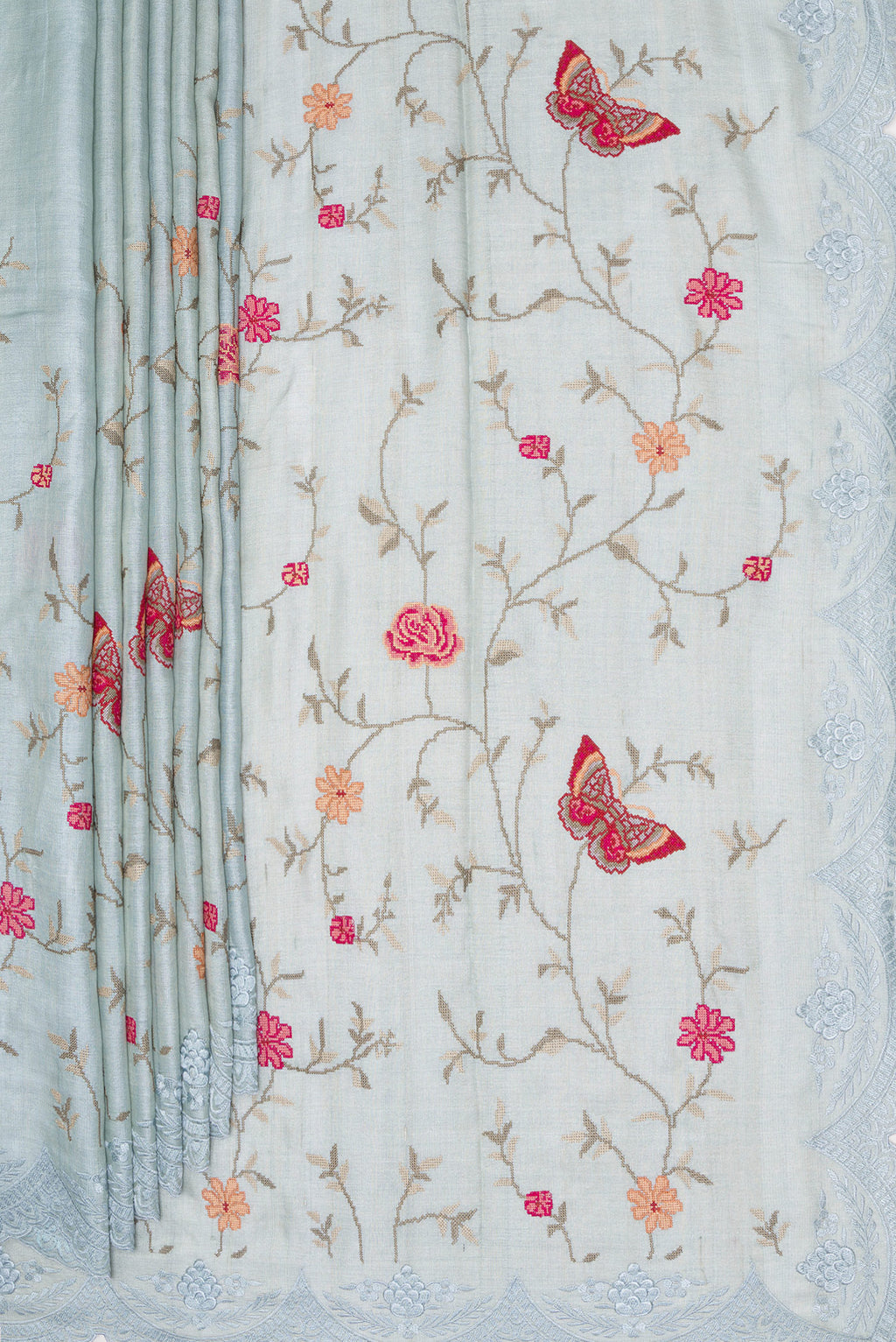 Pleats and pallu of Light Blue Tussar Saree with Embroidery on the body and Embroidery Border. 