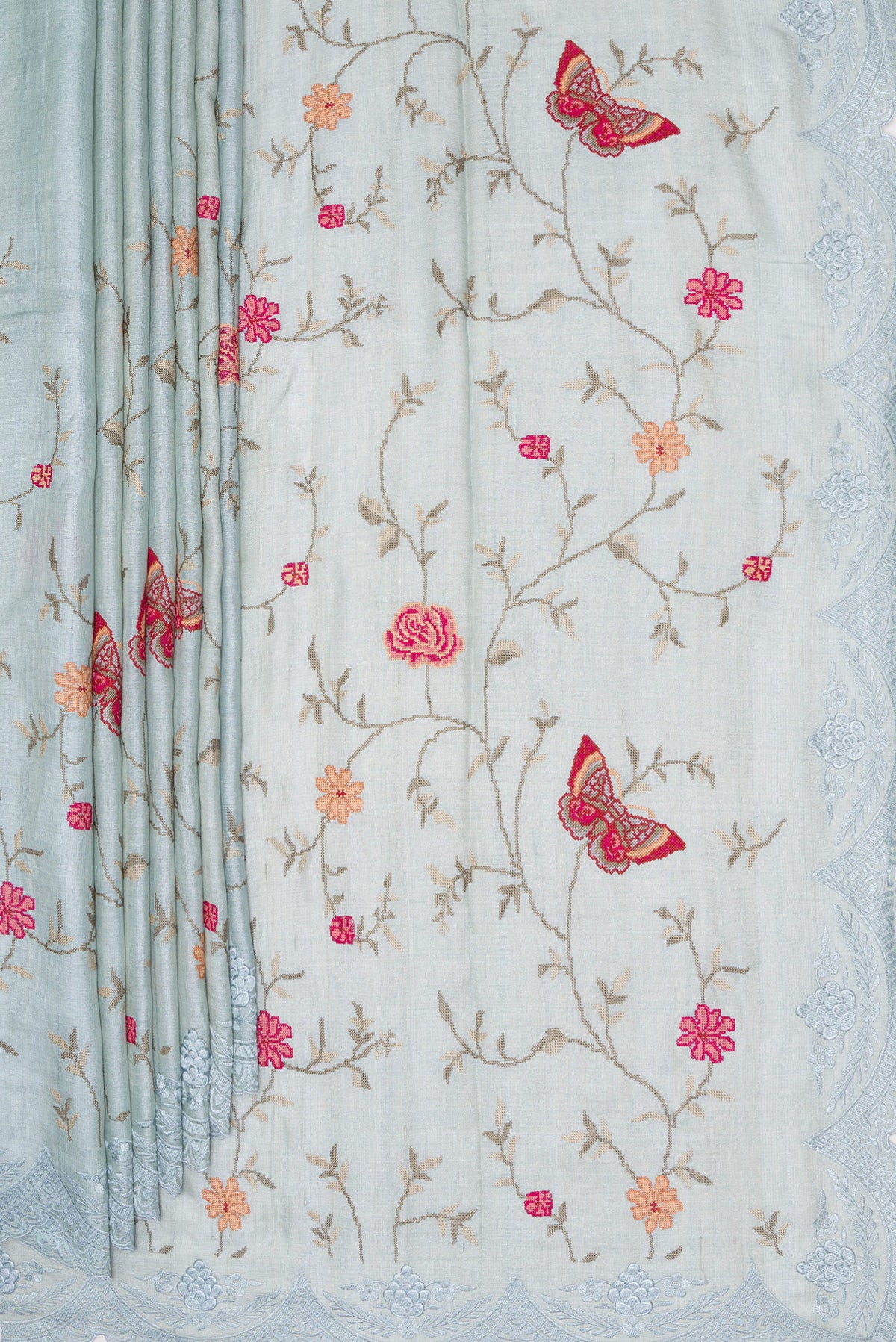 Pleats and pallu of Light Blue Tussar Saree with Embroidery on the body and Embroidery Border. 