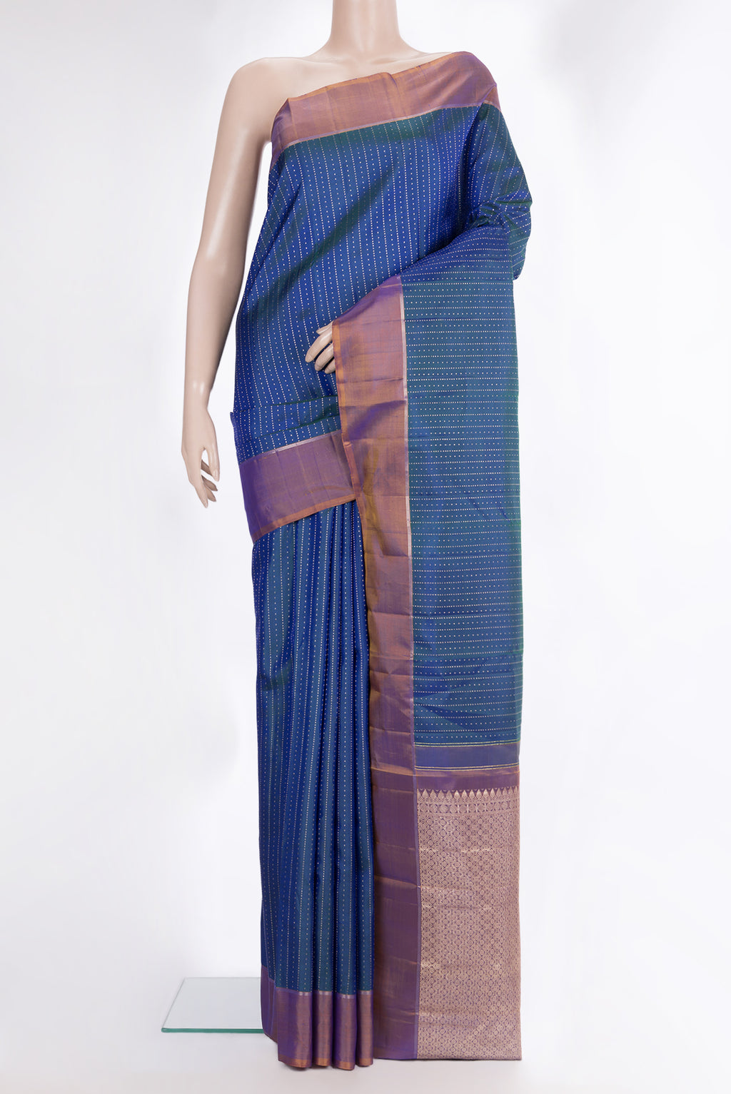Pure Silk Peacock Blue Kanchipuram Saree with Stripes on the body and Zari Border.  displayed on a mannequin