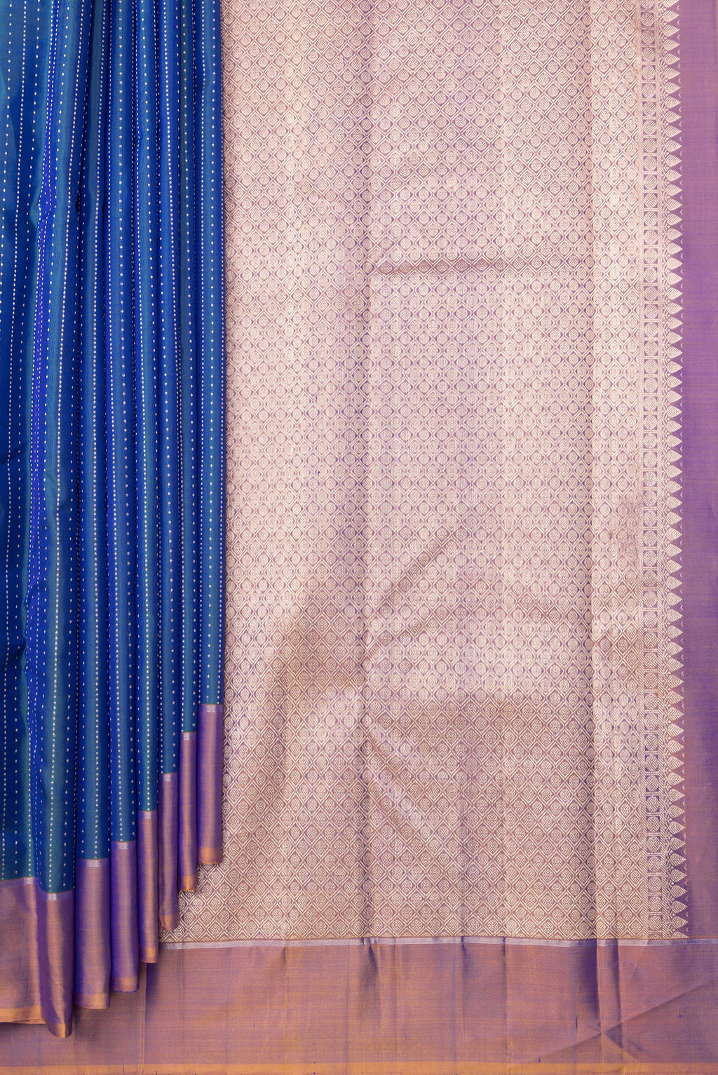Pleats and pallu of Pure Silk Peacock Blue Kanchipuram Saree with Stripes on the body and Zari Border. 