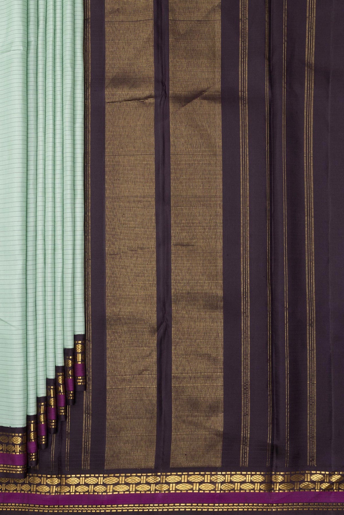 Pleats and pallu of Pure Silk Light Green Dual Tone Kanchipuram Saree with Stripes on the body and Zari Border. 