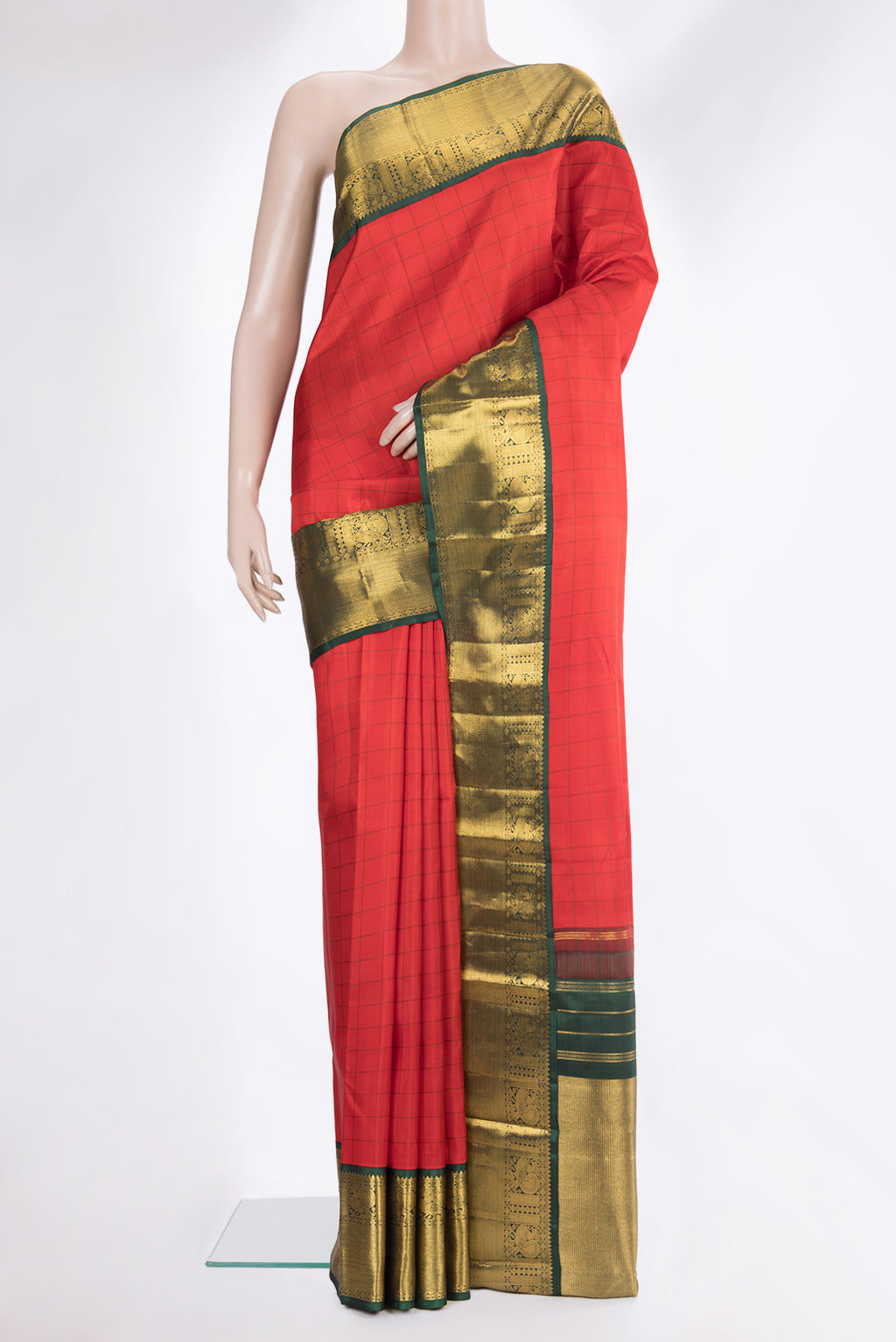 Pure Silk Red Kanjivaram Saree with Checked design on the body and Zari Border.  displayed on a mannequin
