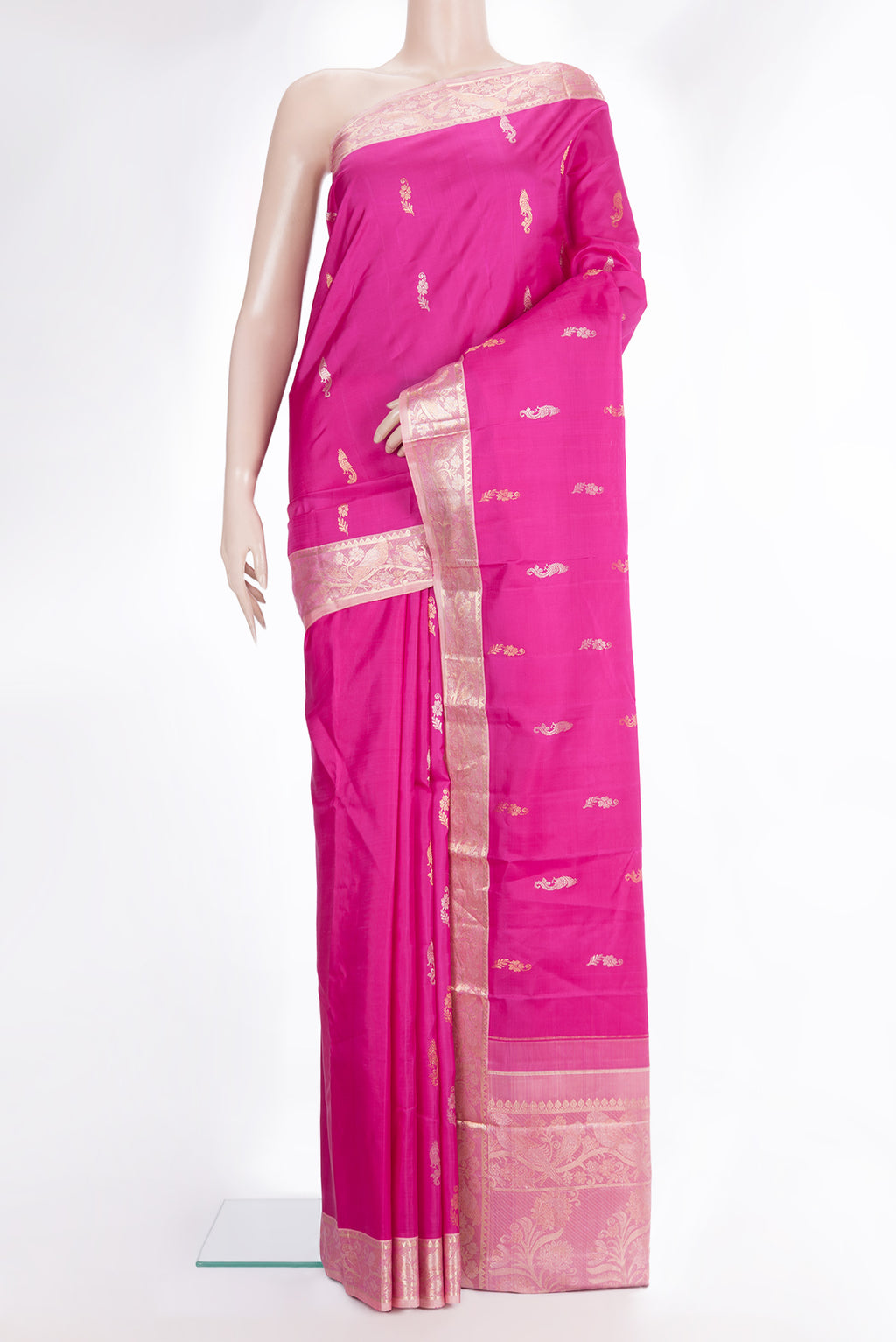 Pure Silk Dark Pink Kanchipuram Saree with Zari Butta on the body and Fancy Border.  displayed on a mannequin