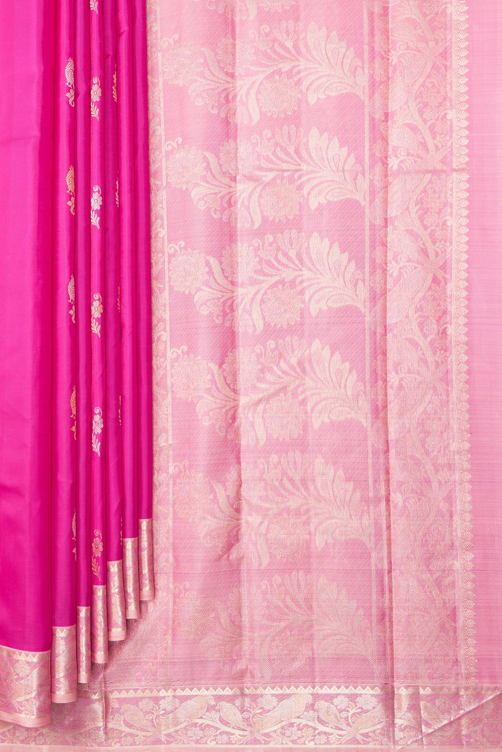 Pleats and pallu of Pure Silk Dark Pink Kanchipuram Saree with Zari Butta on the body and Fancy Border. 