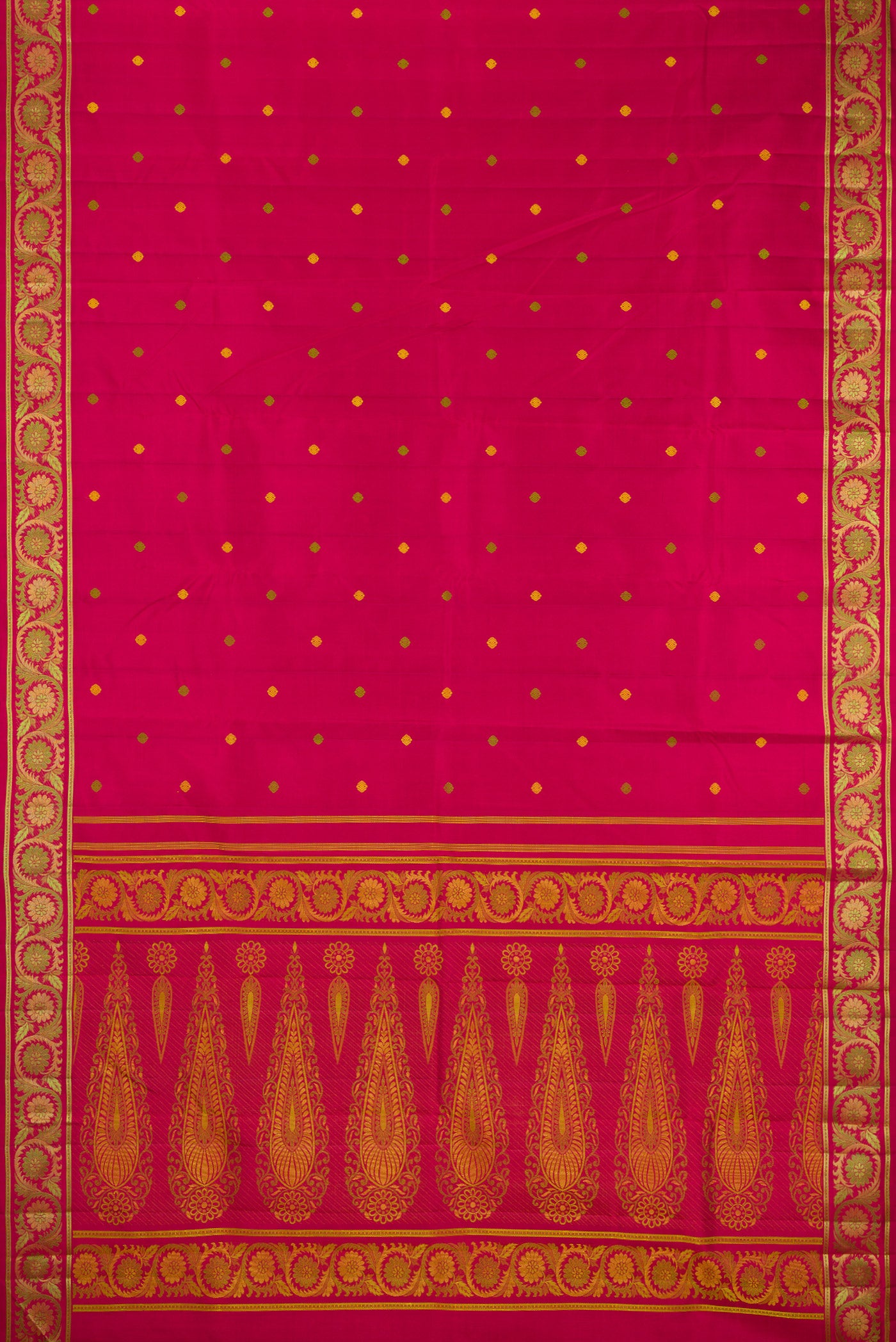 Flat view of Rani Pink Kanchipuram Silk Saree with Thread Butta on the body and Thread Border. 