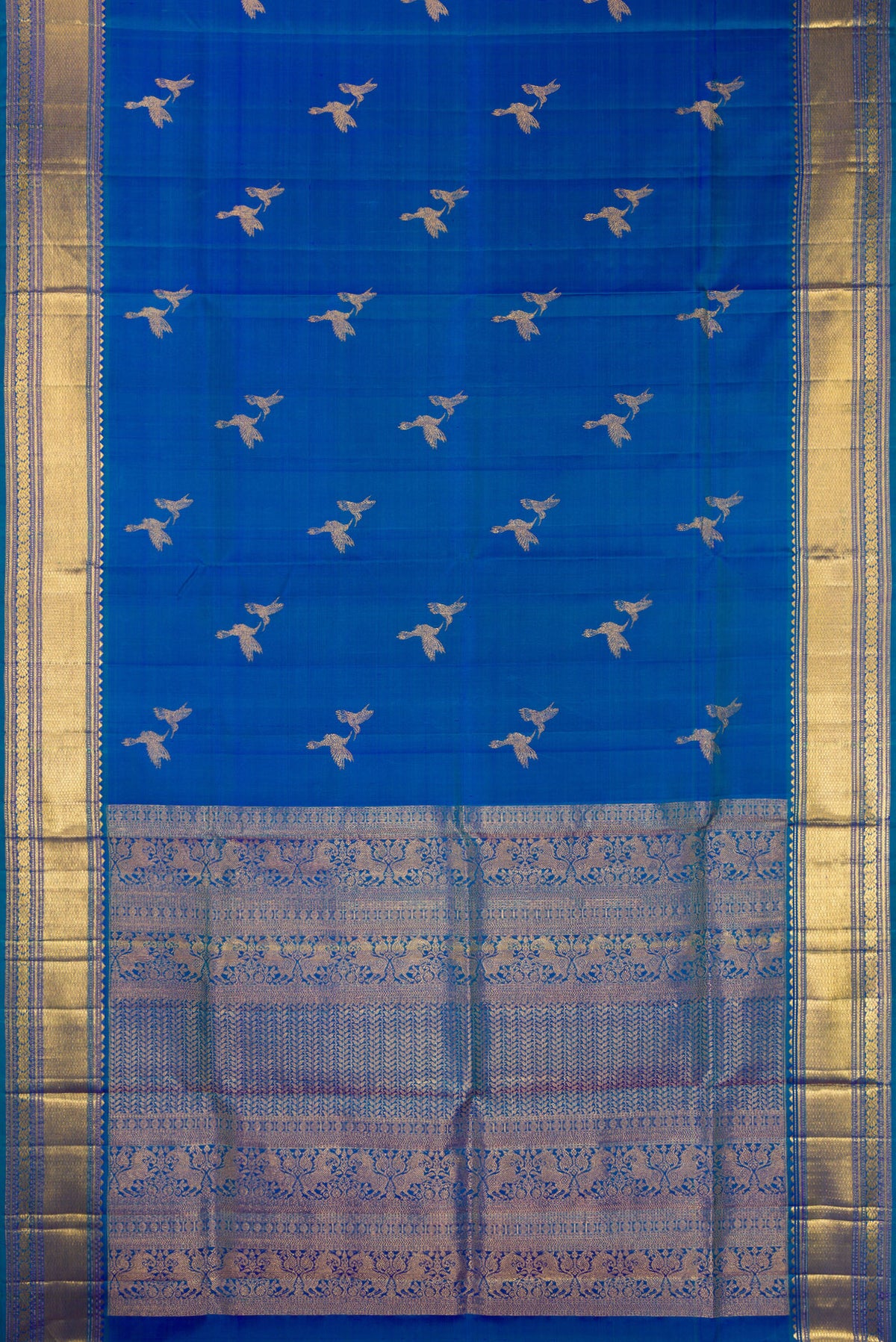 Flat view of Pure Silk Peacock Blue Dual Tone Kanjivaram Saree with Zari Butta on the body and Zari Border. 