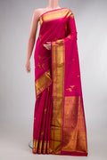 Pure Silk Dark Pink Dual Tone Kanjivaram Saree with Zari Butta on the body and Zari Border.  displayed on a mannequin