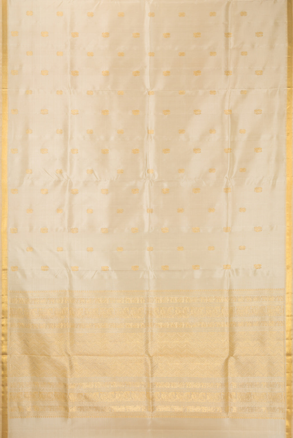 Flat view of Pure Silk Beige Kanjivaram Saree with Zari Butta on the body and Zari Border. 