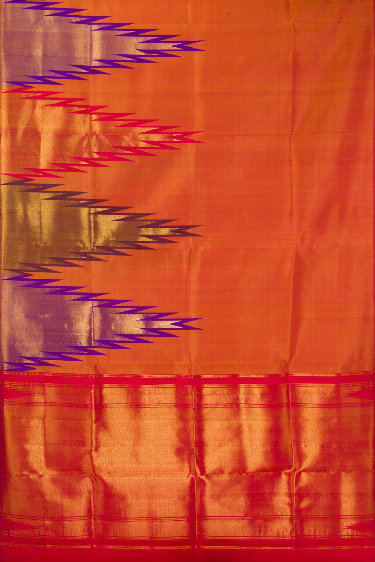 Flat view of Pure Silk Brick Orange Dual Tone Kanchipuram Saree with Plain Body and Temple Border. 