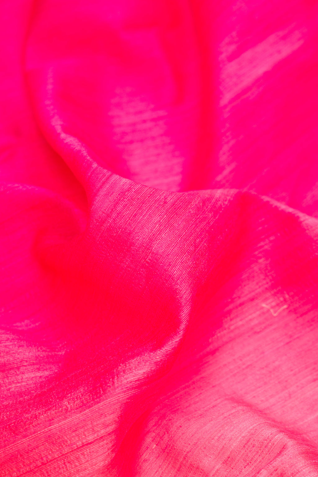Close up of Pure Silk Multi Color Tussar Saree with Ombre design on the body and Thin Zari Line.  displaying folds