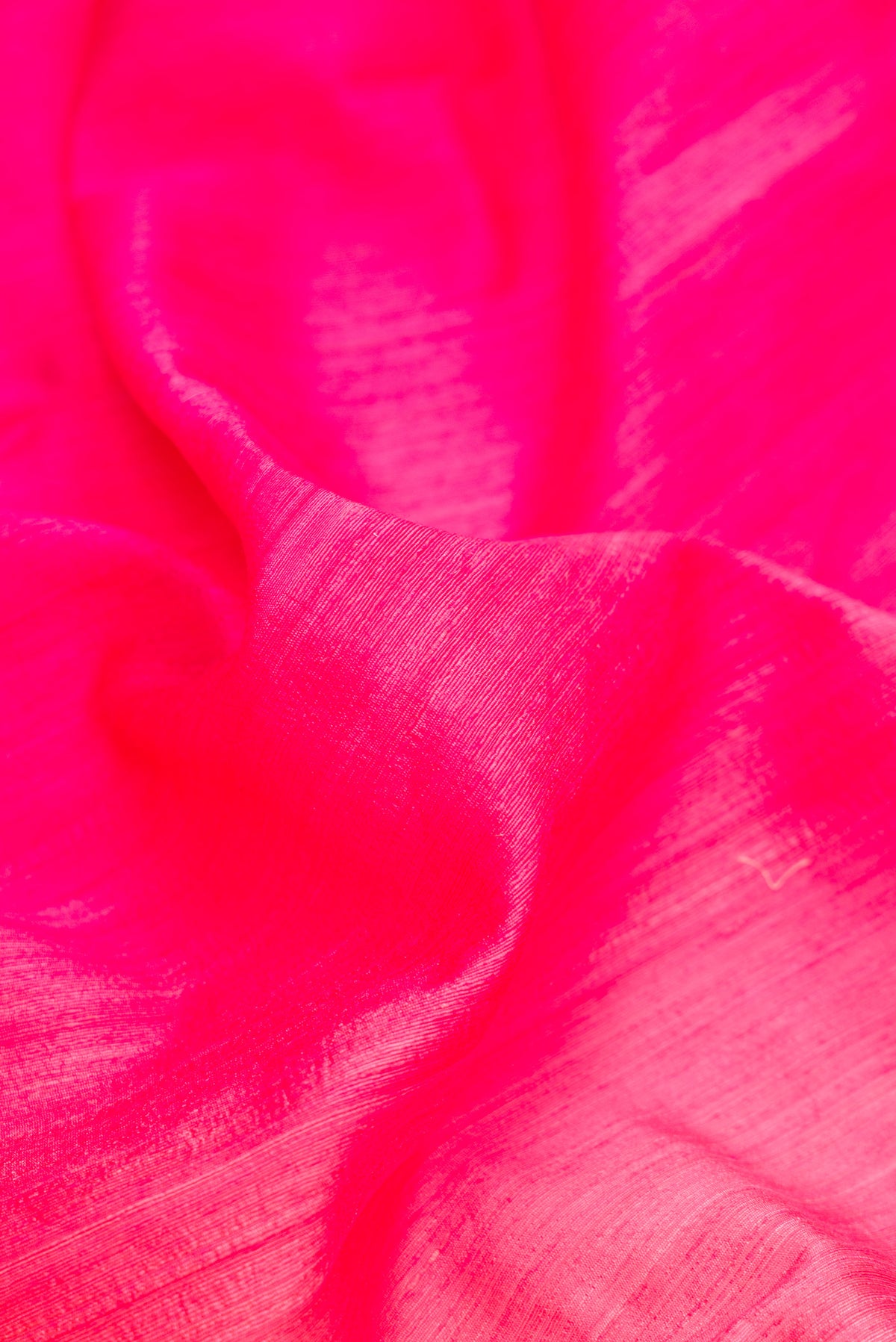 Close up of Pure Silk Multi Color Tussar Saree with Ombre design on the body and Thin Zari Line.  displaying folds
