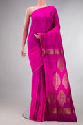 Pure Silk Pink Tussar Saree with Plain Body and Thin Zari Line.  displayed on a mannequin