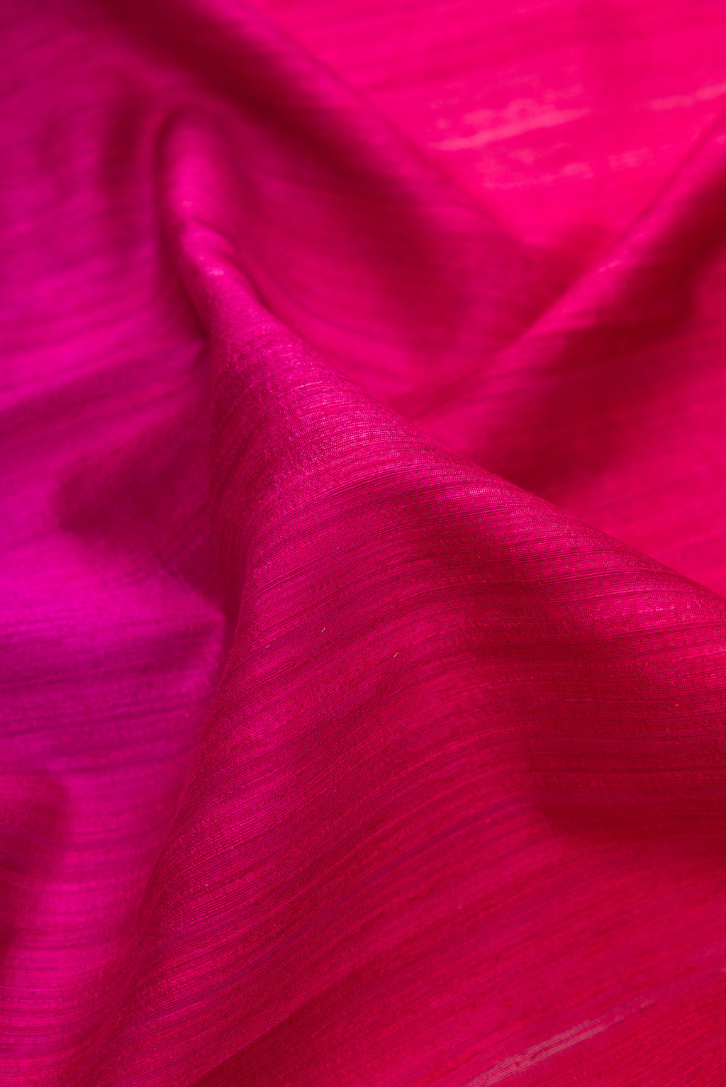 Close up of Pure Silk Multi Color Tussar Saree with Ombre design on the body and Thin Zari Line.  displaying folds