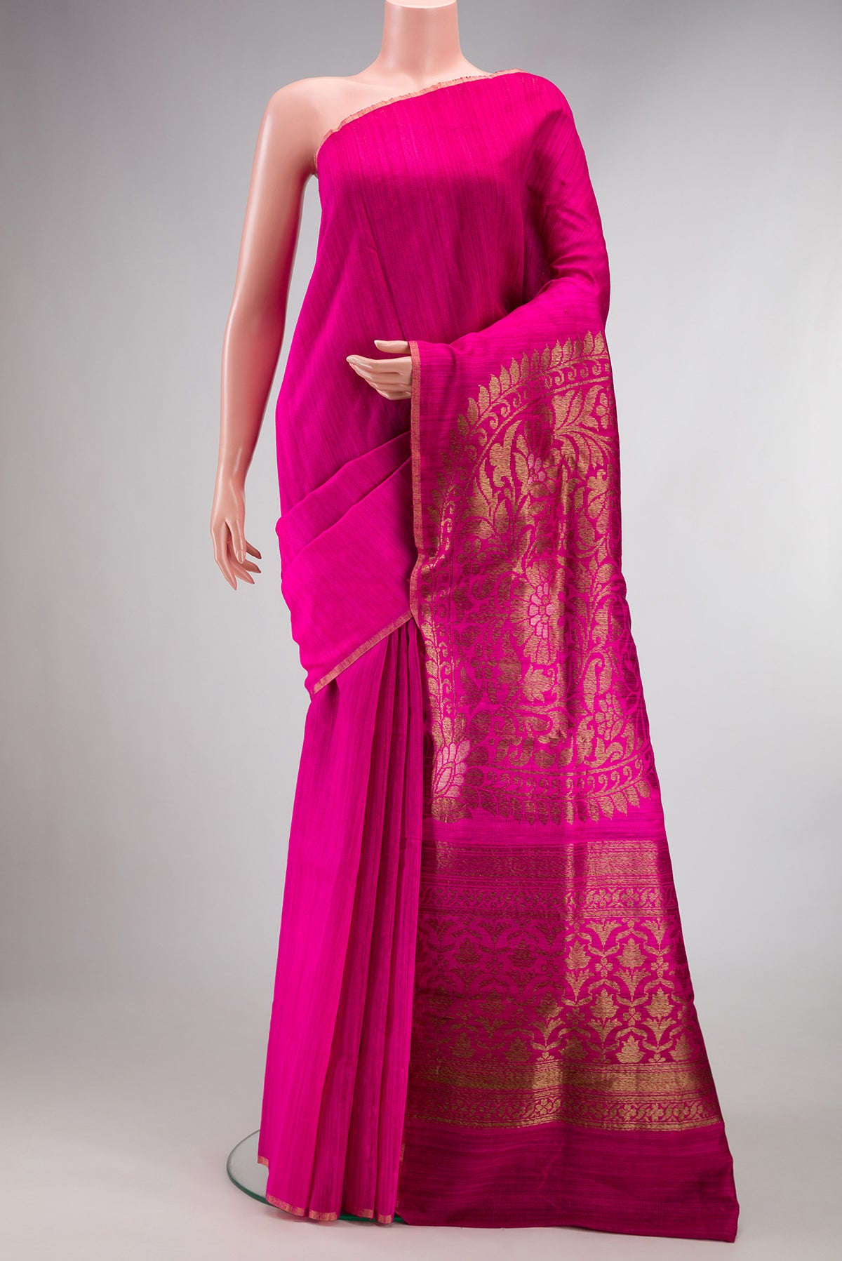Pure Silk Dark Pink Dual Tone Tussar Saree with Plain Body and Thin Zari Line.  displayed on a mannequin