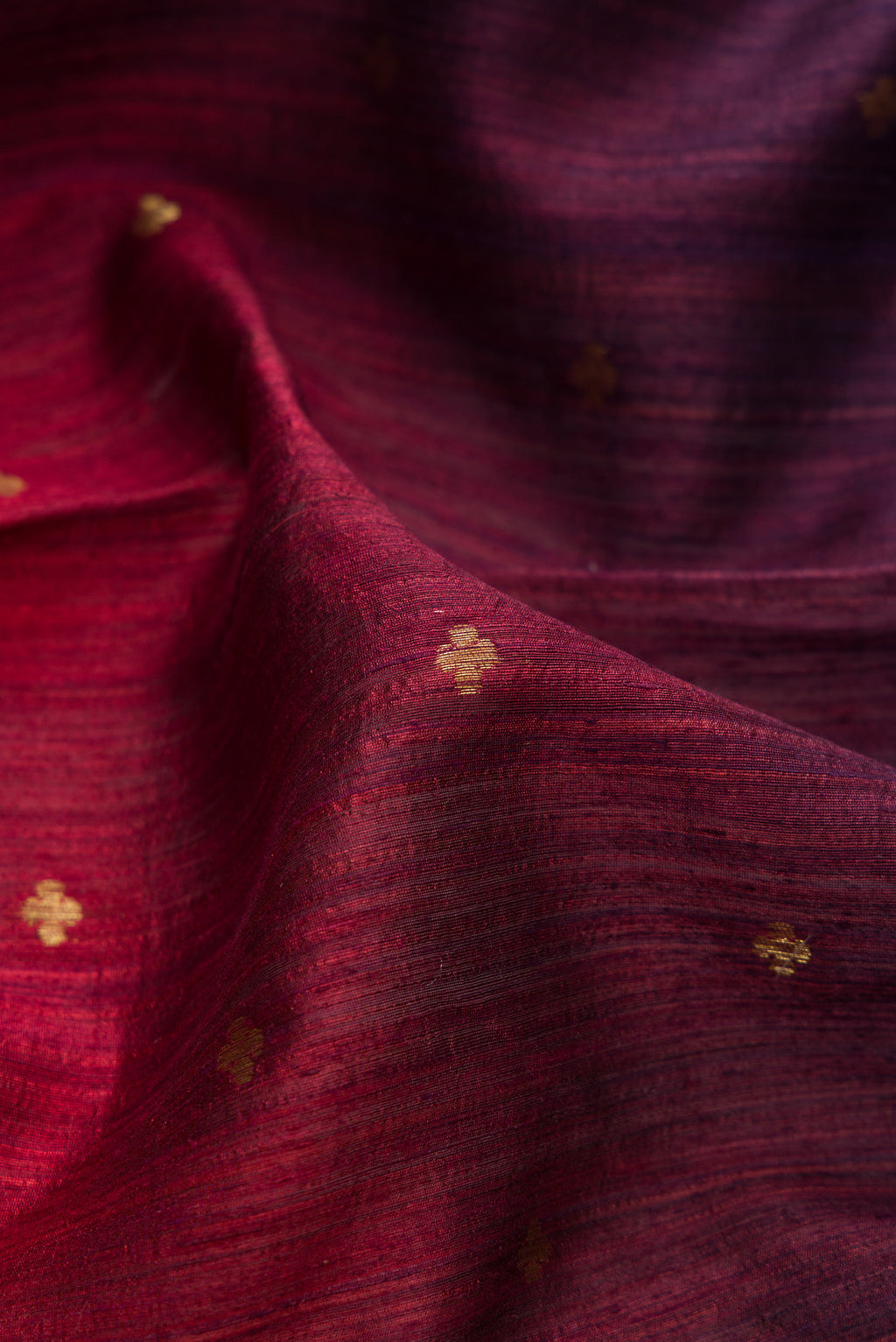 Close up of Multi Color Tussar Saree with Ombre design on the body and Fancy Border.  displaying folds