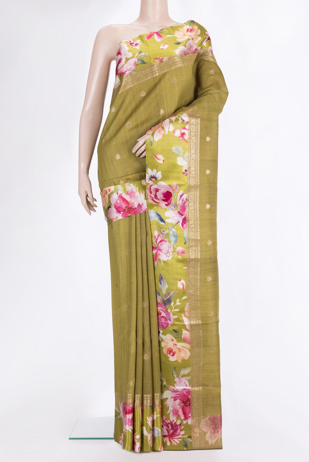 Mehandi Green Tussar Saree with Zari Butta on the body and Fancy Border.  displayed on a mannequin