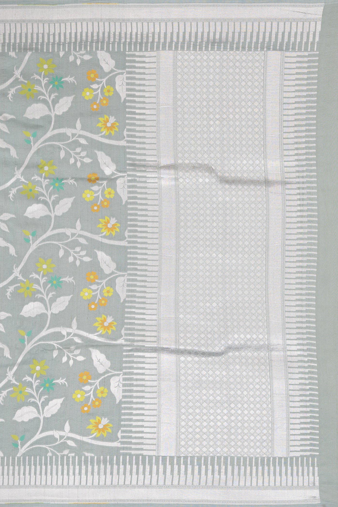 Close up image of the pallu of Grey Tussar Silk Saree with Zari Brocade on the body and Fancy Border. 