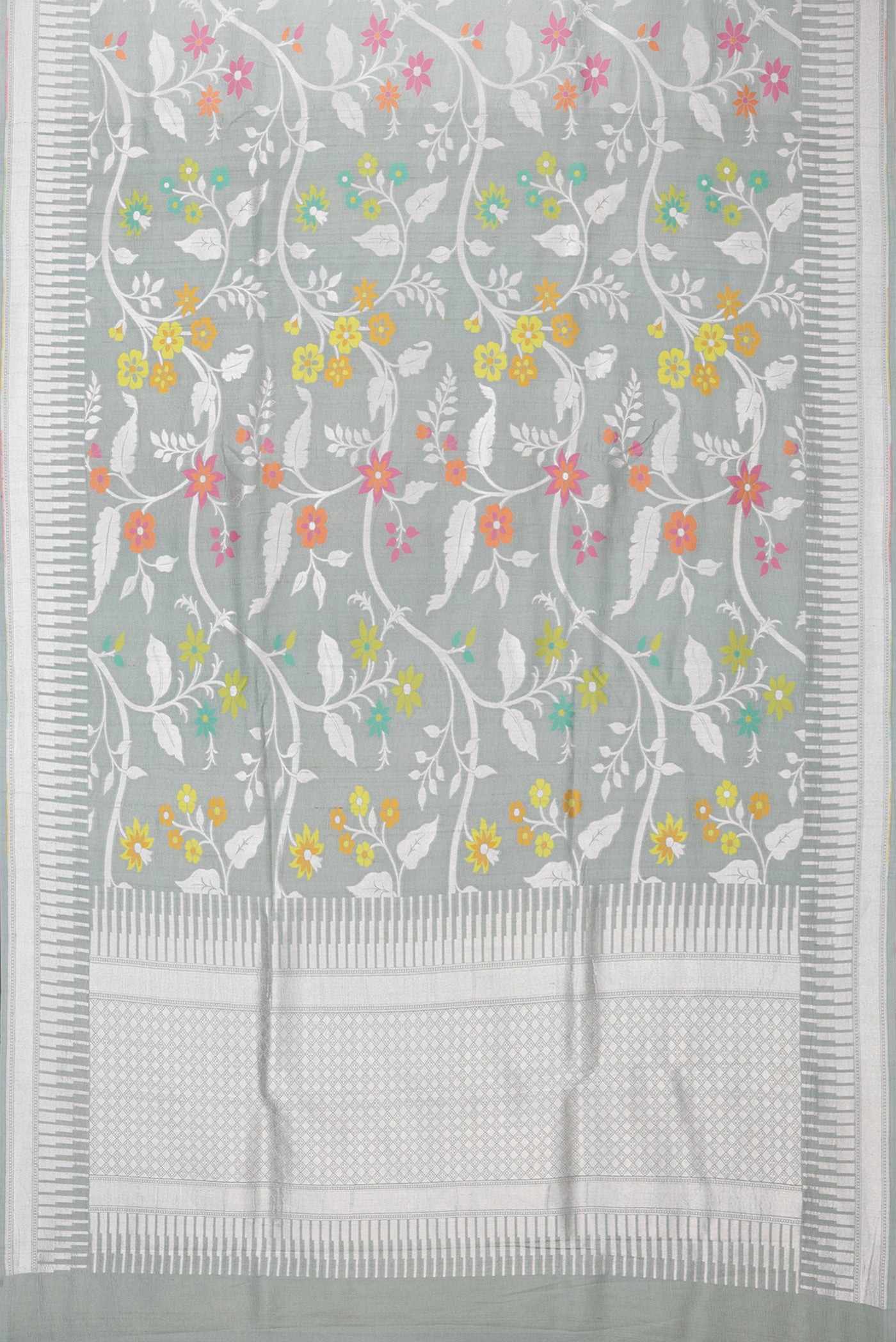 Flat view of Grey Tussar Silk Saree with Zari Brocade on the body and Fancy Border. 