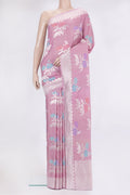 Pink Tussar Silk Saree with Zari And Thread Butta on the body and Fancy Border.  displayed on a mannequin