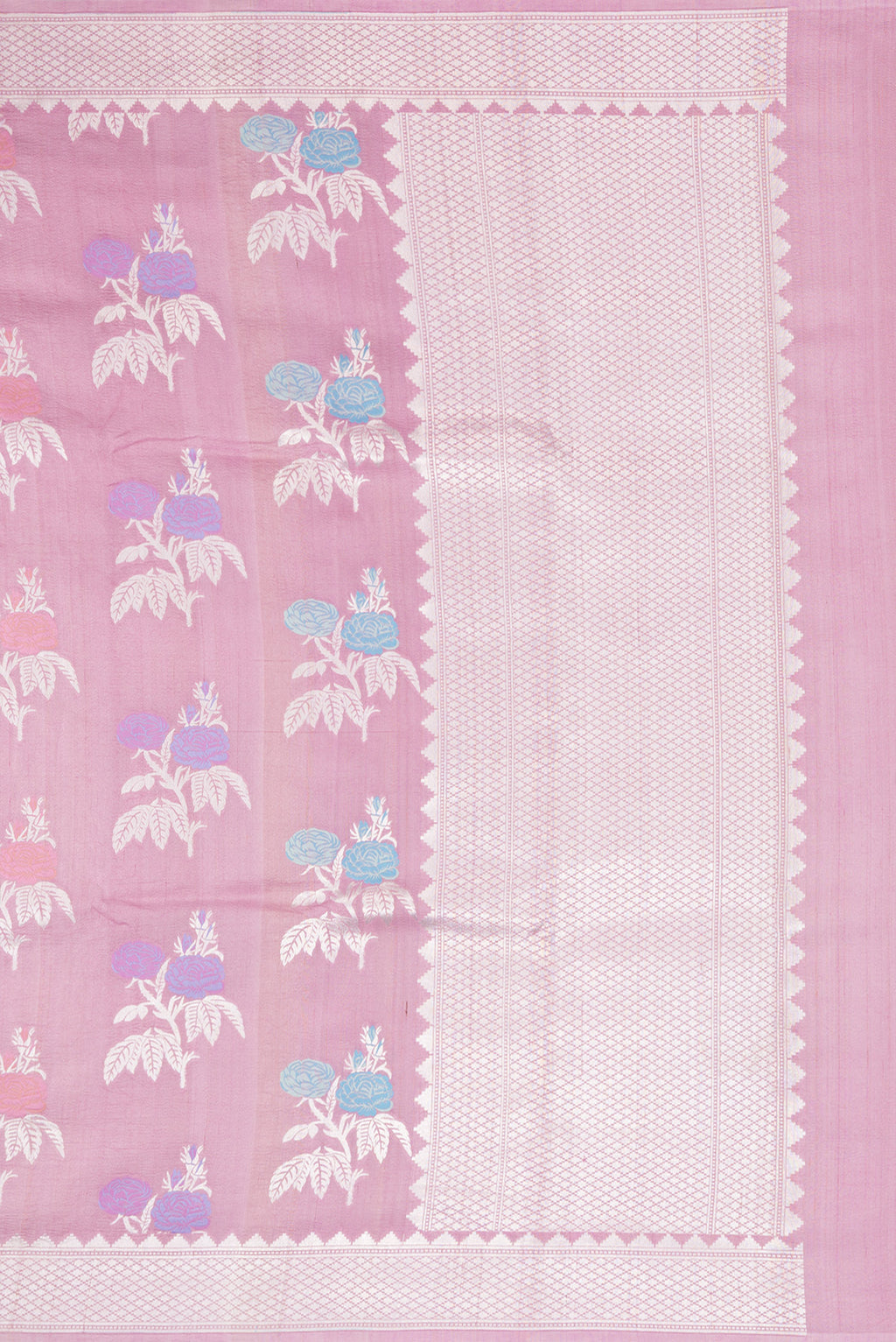 Close up image of the pallu of Pink Tussar Silk Saree with Zari And Thread Butta on the body and Fancy Border. 