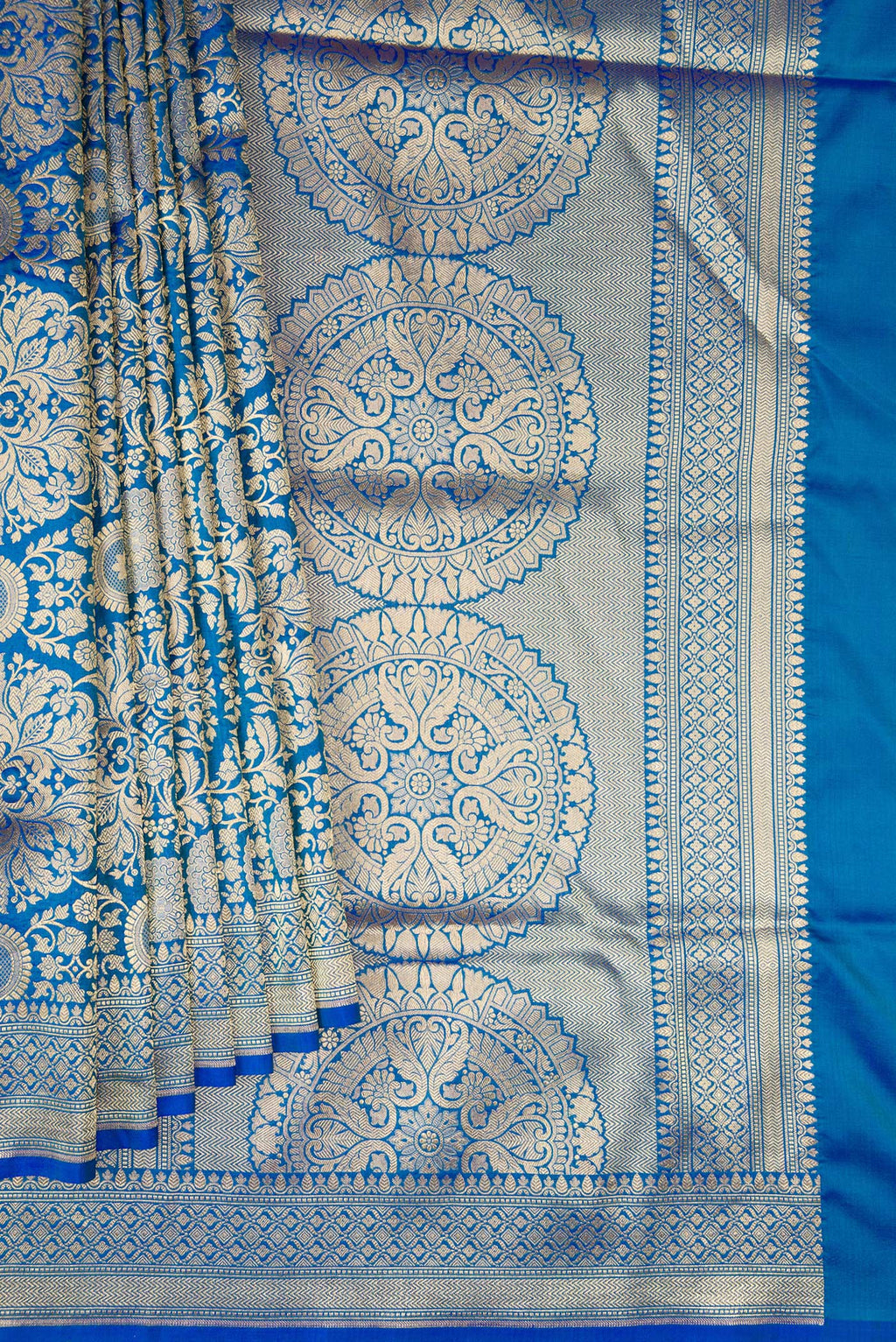 Pleats and pallu of Pure Silk Royal Blue Dual Tone Banarasi Saree with Zari Brocade on the body and Zari Border. 