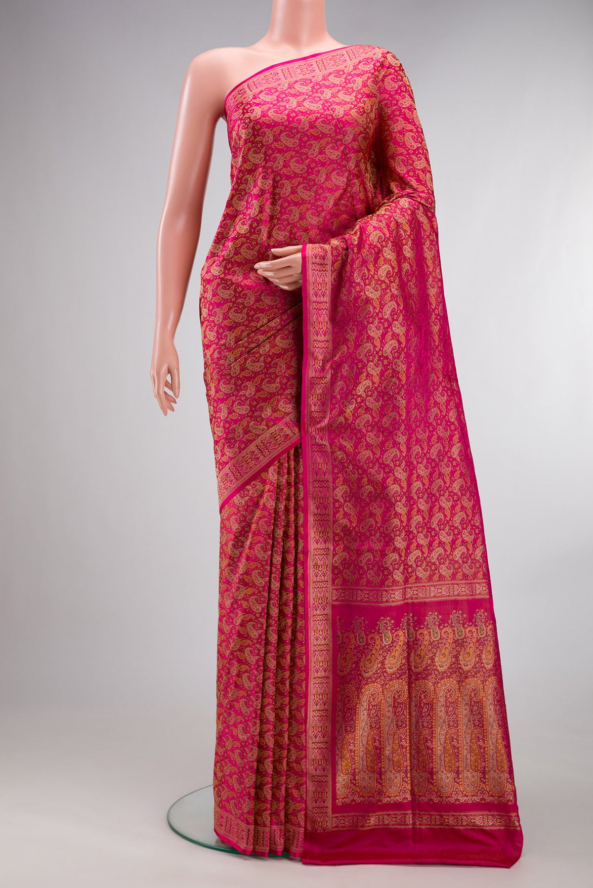 Pure Silk Dark Pink Dual Tone Banarasi Tanchoi Saree with Jacquard design on the body and Thread Border.  displayed on a mannequin
