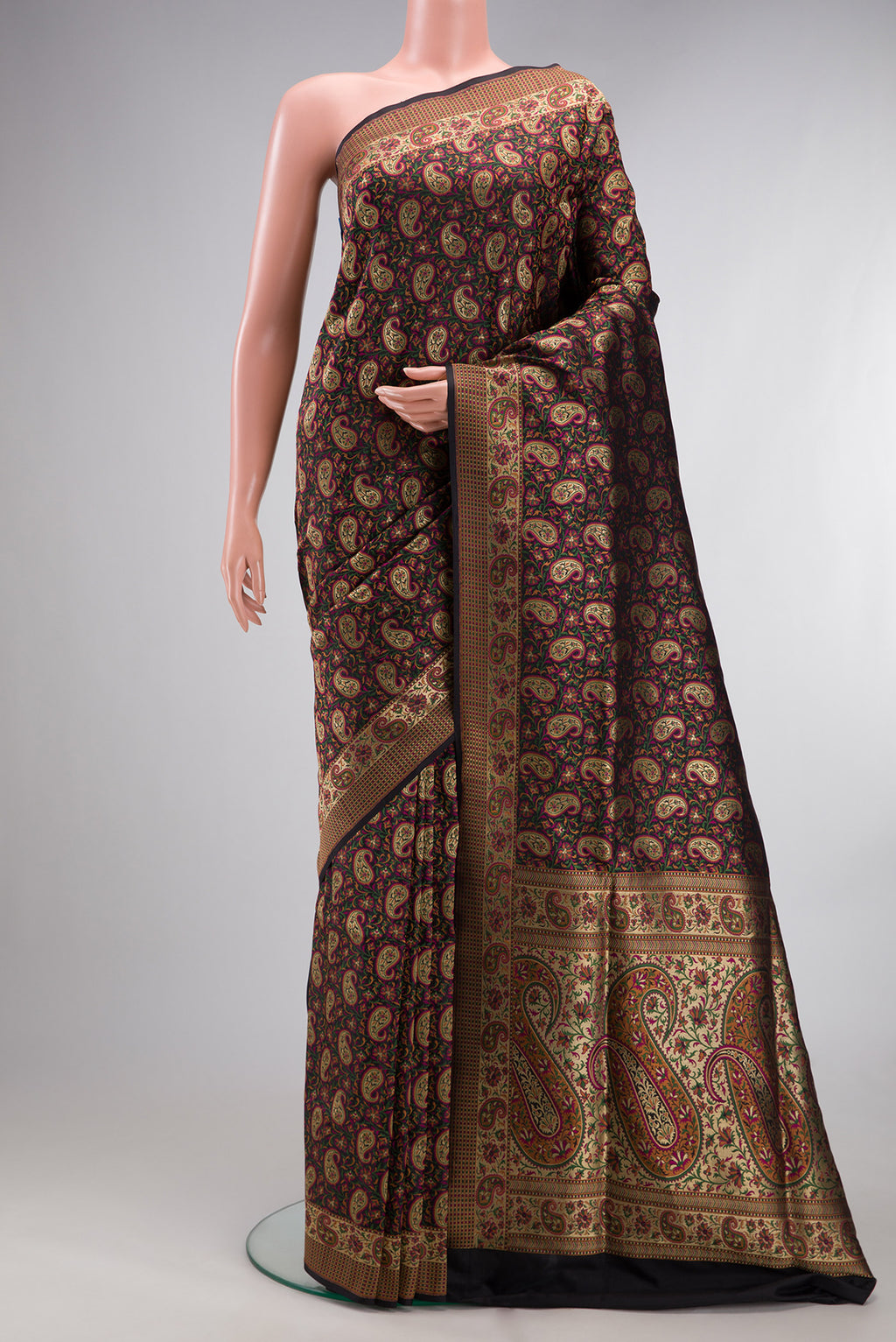 Pure Silk Black Banarasi Jamavar Saree with Jacquard design on the body and Thread Border.  displayed on a mannequin