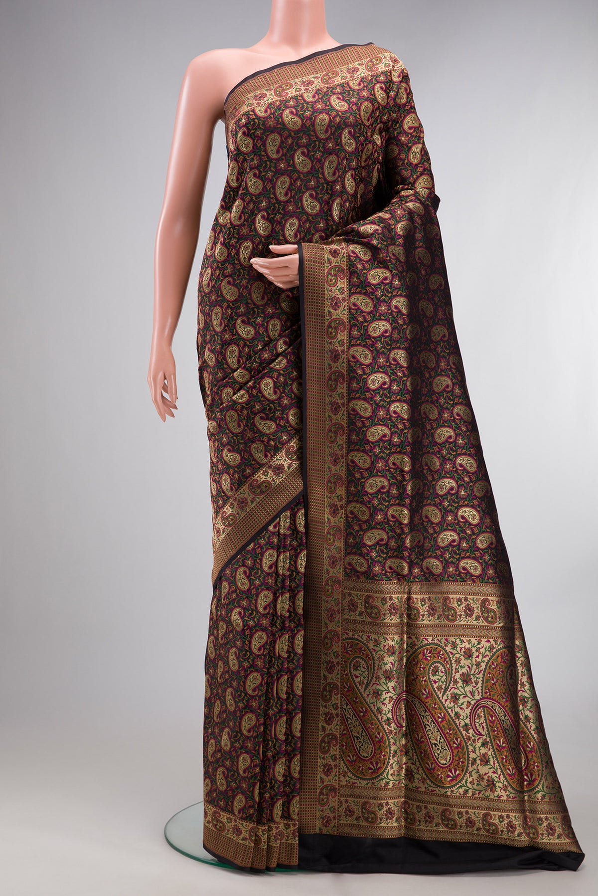 Pure Silk Black Banarasi Jamavar Saree with Jacquard design on the body and Thread Border.  displayed on a mannequin