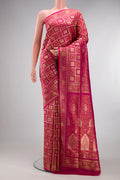Pure Silk Dark Pink Banarasi Jamavar Saree with Zari Brocade on the body and Fancy Border.  displayed on a mannequin